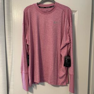 Pink Nike long sleeve dri-fit shirt.